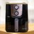 Fritadeira Elétrica sem Óleo/Air Fryer Oster Black Perform Preta com Timer 4,5L